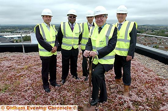 COMPLETED: trust chairman John Jesky plants the final piece of turf on the roof-top eco-garden, with (from left) neonatal lead nurse Ian Yates, clinical director Olubusola Amu, and Vince Boodea and Colin Rankin of Vinci Construction. COMPLETED: trust chairman John Jesky plants the final piece of turf on the roof-top eco-garden, with (from left) neonatal lead nurse Ian Yates, clinical director Olubusola Amu, and Vince Boodea and Colin Rankin of Vinci Construction.
