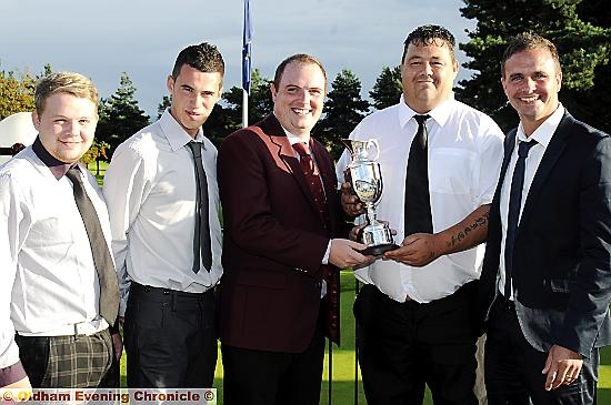 REPEAT PERFORMANCE: Werneth aces Gareth Hey (left), Liam Dwayre, Clint Shaw and Steve Lynch receive their trophy from club captain Lee Rowbotham. REPEAT PERFORMANCE: Werneth aces Gareth Hey (left), Liam Dwayre, Clint Shaw and Steve Lynch receive their trophy from club captain Lee Rowbotham.