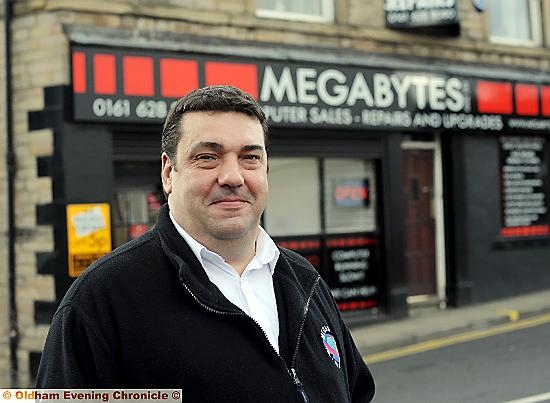 GOING for growth: John Salt outside his Lees shop
GOING for growth: John Salt outside his Lees shop