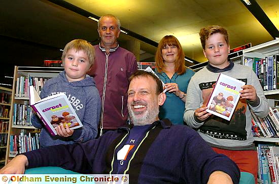 INSPIRED . . . Inspiral Carpets frontman Tom Hingley (above) at Oldham Library with the Whitaker family, l-r Isaac, David, Lisa and Olivia. 
