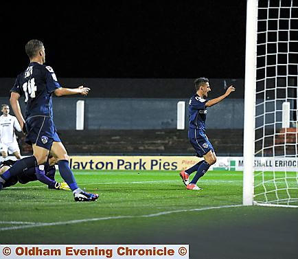 IT’S THERE: Matt Derbyshire (centre) hits his second goal in as many games. 