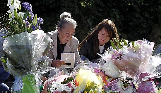 Floral tributes at the scene in Hattersley where police constables Fiona Bone and Nicola Hughes were killed.  


