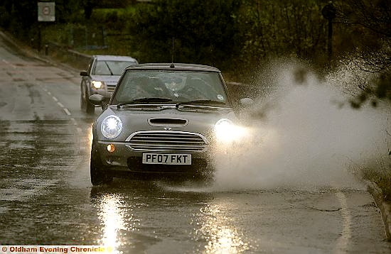 Heavy rain in Delph Road, Denshaw yesterday. Heavy rain in Delph Road, Denshaw yesterday.