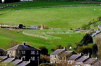 VISION for the future . . . how the house (at the centre of the picture) will look in the Delph hillside 