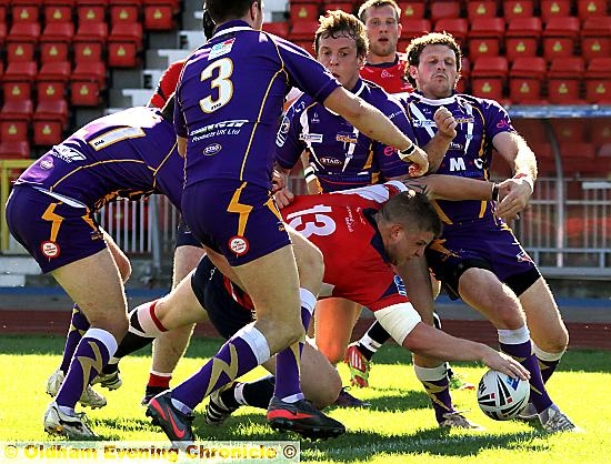 TOUCH DOWN: star man Alex Thompson stretches out his right arm to add to Oldham’s tally against Gateshead. 