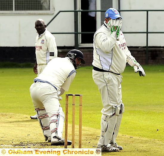 BAMFORD Fieldhouse wicketkeeper Jason Maher can’t quite believe it after a Mel Austin delivery beats the outside edge of Greenfield batsman Ian Batterbee. 
