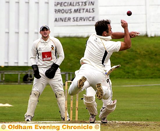drop that: Royton batsman Craig Joy smashes the ball straight back to bowler Travis Townsend - who failed to hold on to it 