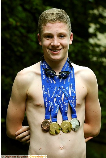 DYLAN shows off his medals 