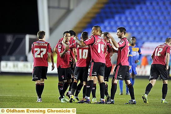 CHARLIE celebrates with his team-mates. 