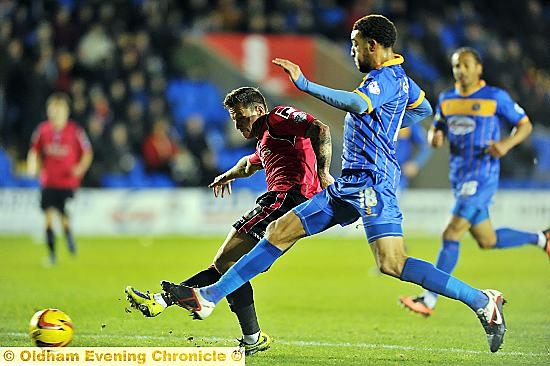 PROPER CHARLIE: striker MacDonald shows what Athletic have been missing with a clinical finish. 
