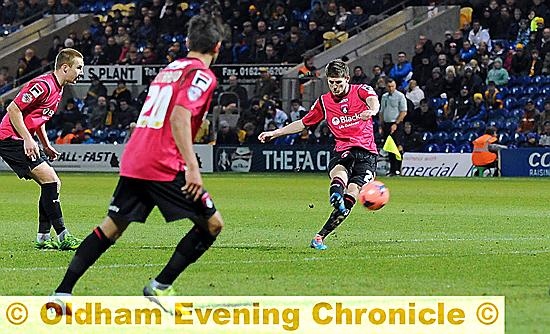 Adam Rooney completes the rout from the penalty spot 
