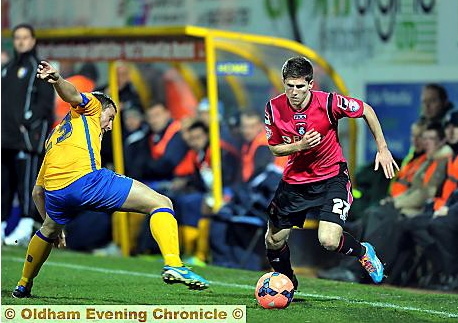 Danny Philliskirk beats his man at Mansfield in the FA Cup second-round replay. 