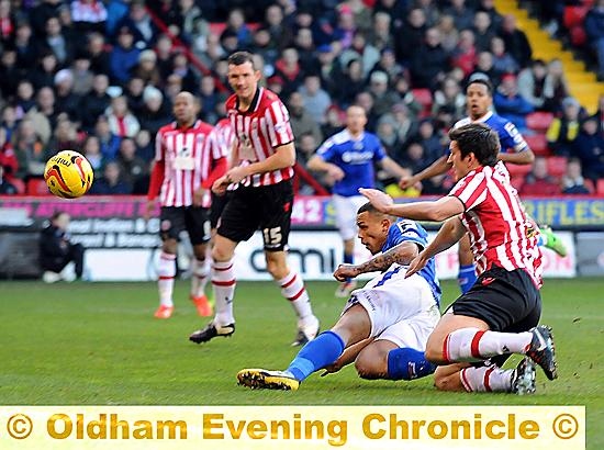 ON TARGET: Jonson Clarke-Harris puts Athletic in front at Bramall Lane 
