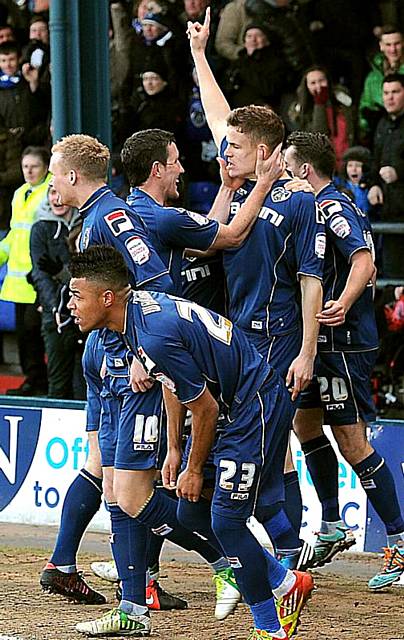 Matt Smith celebrates Latics’ first goal