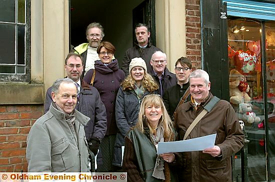 Major sponsors seeing how their money will be spent at the George Street Chapel . . . (back row), Andrew Fielding (Age UK), Adrian Walker (Lambert Walker, contractors); (centre, from the left) Henry Owen-John (English Heritage), Sara Hilton, Laura Whalley (Heritage Lottery Fund), Jeff Hinchcliffe (Age UK), Gavin Richards (Architectural Heritage Fund); (front, from the left) Sandy Roy (Heritage Lottery Fund), Yvonne Lee (chief executive Age UK Oldham) and John Prichard (architect) Major sponsors seeing how their money will be spent at the George Street Chapel . . . (back row), Andrew Fielding (Age UK), Adrian Walker (Lambert Walker, contractors); (centre, from the left) Henry Owen-John (English Heritage), Sara Hilton, Laura Whalley (Heritage Lottery Fund), Jeff Hinchcliffe (Age UK), Gavin Richards (Architectural Heritage Fund); (front, from the left) Sandy Roy (Heritage Lottery Fund), Yvonne Lee (chief executive Age UK Oldham) and John Prichard (architect)