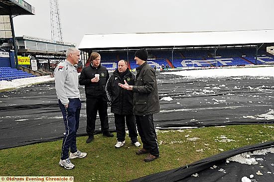 SNOW no problem: TONY Philliskirk (left) with Yeovil manager Gary Johnson (second, right), his assistant Terry Skiverton and a local referee at 1pm . 