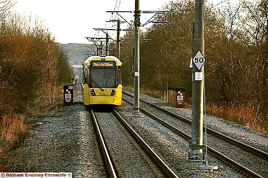 TRAMS back running close to the scene of last night’s tragedy 
