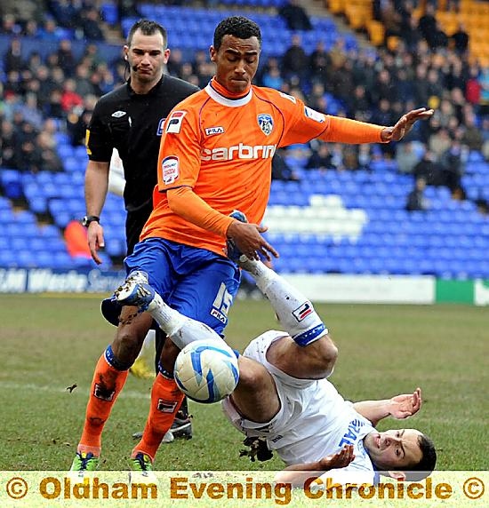 GET STUCK IN . . . Athletic winger Jordan Obita shows commitment to the cause. 

