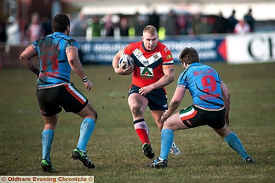 VICTORY BOOST. . . Danny Langtree in full flight for Oldham last weekend. 