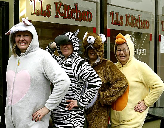 Lynda Quarmby, Zoe Annis, Nikki Wroe and Leslie Bill go the oneside route to fund-raising in Mossley. 
