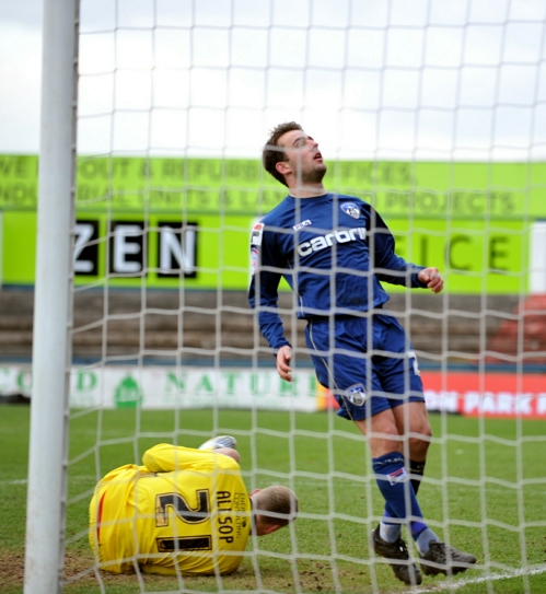 WHAT HAVE I DONE? . . . Jose Baxter couldn't believe it when his chipped penalty was saved by the Bournemouth keeper. 
