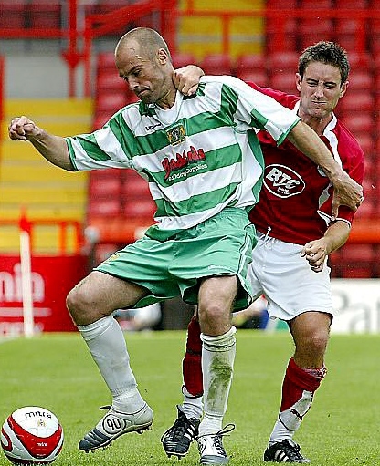 FRESH FACE AT THE HELM . . . Lee Johnson (right), in action for Bristol City, was today installed as the next manager of Athletic. FRESH FACE AT THE HELM . . . Lee Johnson (right), in action for Bristol City, was today installed as the next manager of Athletic.