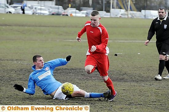 ON THE SLIDE... Ashley Young (right), of Rifle Rangers, hurdles Red Star's Kane Duffy.
ON THE SLIDE... Ashley Young (right), of Rifle Rangers, hurdles Red Star's Kane Duffy.