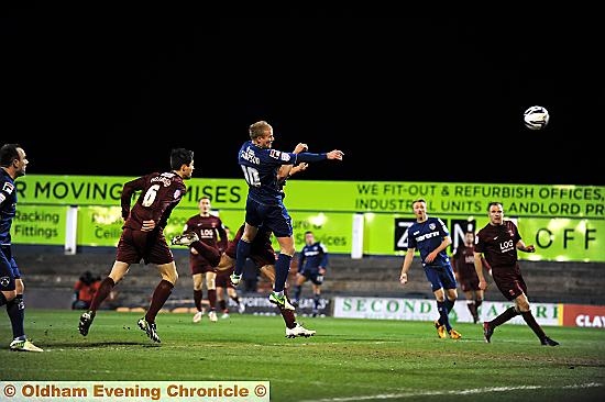 Robbie Simpson climbs above the Hartlepool defence to direct Jose Baxter’s cross into the net 