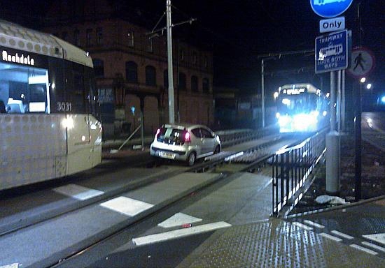 GOING nowhere, another car, stuck on the line at Mumps  

