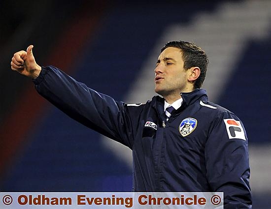 THUMBS UP: Lee Johnson applauds his team after they defeated Hartlepool 3-0 last night. 