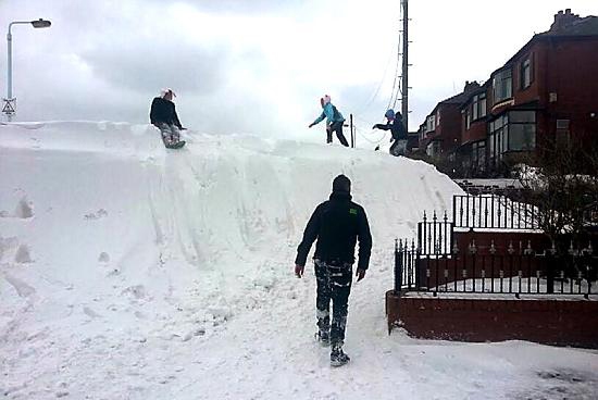 Massive drifts become slides for Haven Lane residents  

