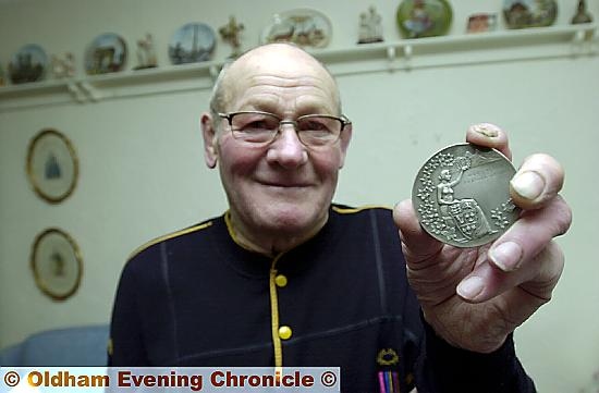 Herbert Hall with his Commonwealth Games Silver Medal from 1952 