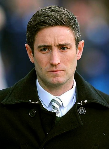 FOOD FOR THOUGHT . . . Athletic boss Lee Johnson during last night’s game 
