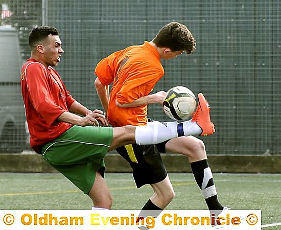 GETTING THEIR KICKS . . . Oddies' Carlton Brierley (orange shirt) and Legends' David Laria.
GETTING THEIR KICKS . . . Oddies' Carlton Brierley (orange shirt) and Legends' David Laria.