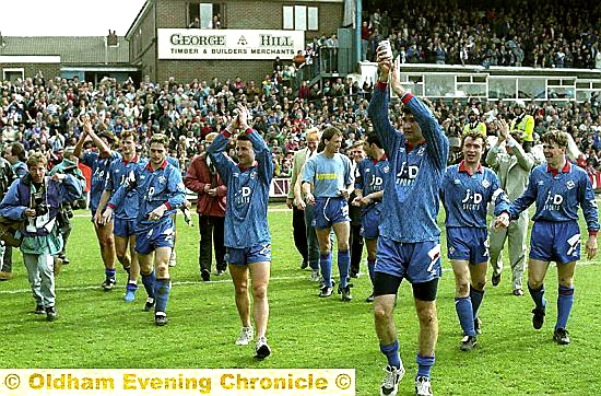 SURVIVAL CELEBRATION . . . Athletic’s players after their great escape in 1993.