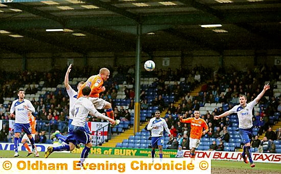 HIGH RISE: Robbie Simpson gets above the Bury defence to power in a header, but it was Matt Smith who eventually broke the deadlock. HIGH RISE: Robbie Simpson gets above the Bury defence to power in a header, but it was Matt Smith who eventually broke the deadlock.