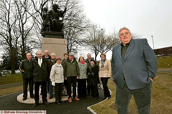 Councillor Howard Sykes (front) is pleased to see the statue in place. With him are members of St James’s Church and Shaw and Crompton Parish council 
