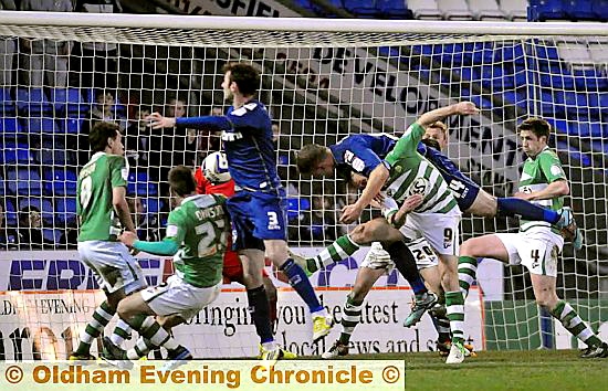 Matt Smith heads Athletic’s winning goal. 