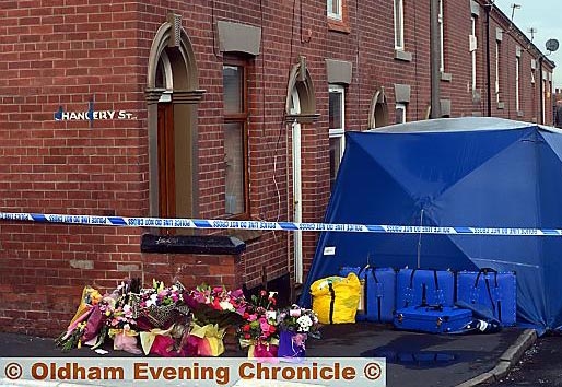 FLOWERS were quickly left at the crime scene by wellwishers 
