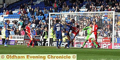 AHEAD of the game: defender Jean-Yves Mvoto scores the last-gasp winner. AHEAD of the game: defender Jean-Yves Mvoto scores the last-gasp winner.