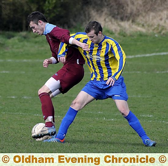 CLOSE CONTACT . . . Hulmeians' Jordan Schofield (purple shirt) shields the ball from Littleborough's Ryan Healy. 



CLOSE CONTACT . . . Hulmeians' Jordan Schofield (purple shirt) shields the ball from Littleborough's Ryan Healy. 