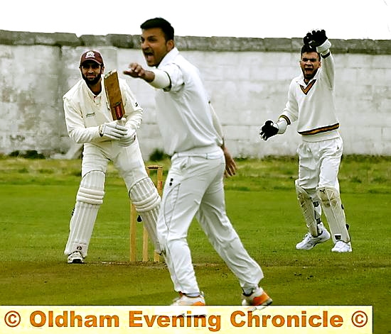 NOT OUT: Radcliffe batsman Anis Patel survives an appeal from Oldham's bowler Aqueel Ashraf. 