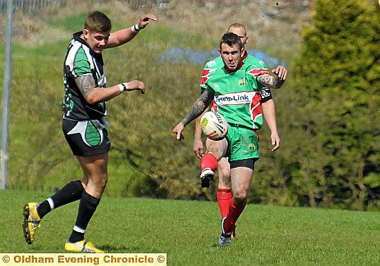 KICK FOR VICTORY: Mick Diveney (right) landed four goals for Waterhead.
KICK FOR VICTORY: Mick Diveney (right) landed four goals for Waterhead.