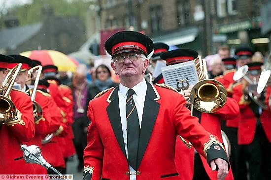MARCHING PROUDLY: Dobcross Silver Band entertain the crowds, led by club president John Holden  

