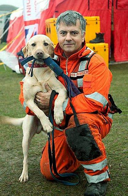 READY for duty: search and rescue dog Ace with his handler Mike Dewar
READY for duty: search and rescue dog Ace with his handler Mike Dewar