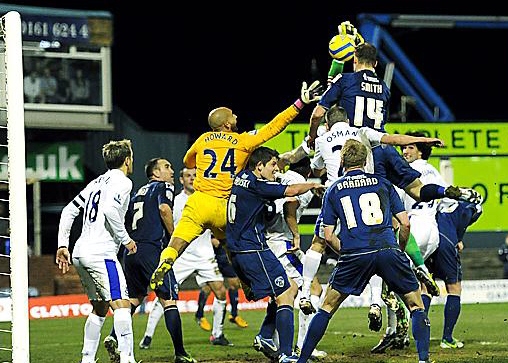 RAISE THE ROOF.. Matt Smith climbs high to score a last-gasp equaliser against Everton. 