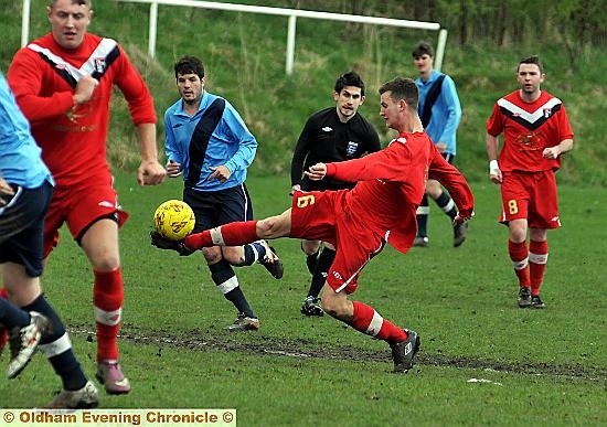 GO FOR IT . . . Springhead’s Johnny Pauley gets a shot in against Stockport Georgians GO FOR IT . . . Springhead’s Johnny Pauley gets a shot in against Stockport Georgians