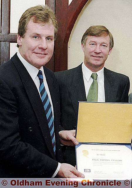 HERO MANAGERS: 1990 and special guest Alex Ferguson presents the Paul Harris Fellowship Award to then-Athletic boss Joe Royle. The Chadderton and Failsworth Rotary Club’s top prize was presented to Royle to mark his services to the community. HERO MANAGERS: 1990 and special guest Alex Ferguson presents the Paul Harris Fellowship Award to then-Athletic boss Joe Royle. The Chadderton and Failsworth Rotary Club’s top prize was presented to Royle to mark his services to the community.