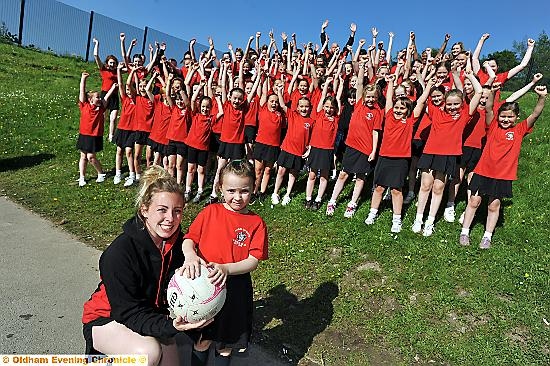 NETBALL HEAVEN: Saddleworth Coach Kelly Hutchins and youngster Rachel Flanagan, aged seven. 