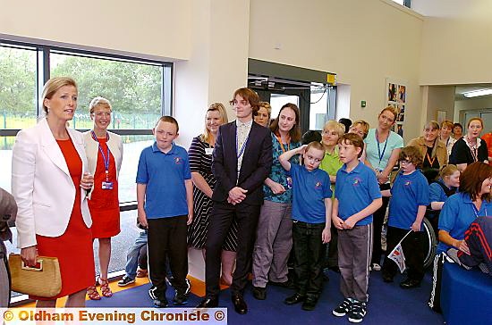 Students and teachers look on as the Countess gives her thank-you speech 